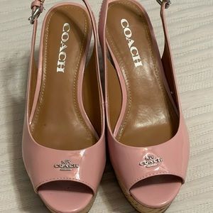 Pink patent leather sandals by Coach